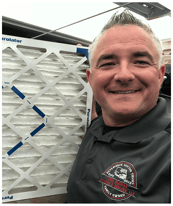 Aaron wiht a furnace filter